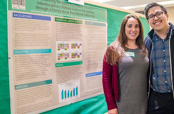 Nurse Practitioner fellows pose with their research project.